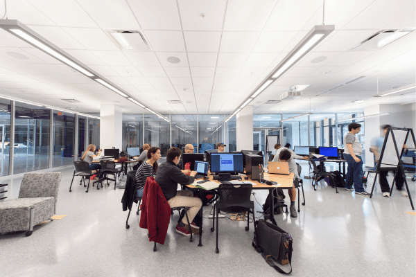 students in a studio working at computer stations