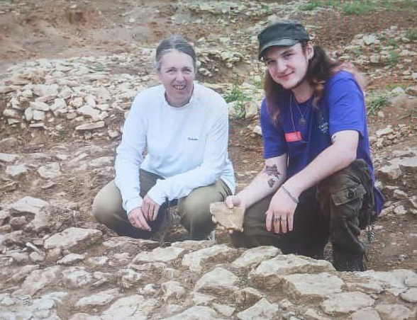 LSU student Cam Crooks (right) providing tours of the Roman site during the Northamptonshire Roman Fest with a volunteer. Irchester Field School, Northamptonshire, UK.