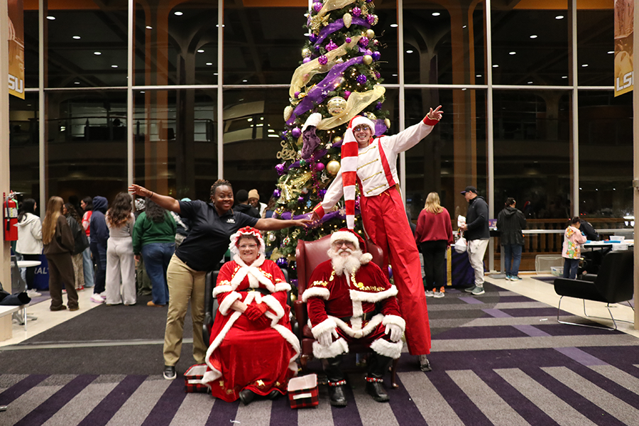 staff with Santa and Mrs. Claus